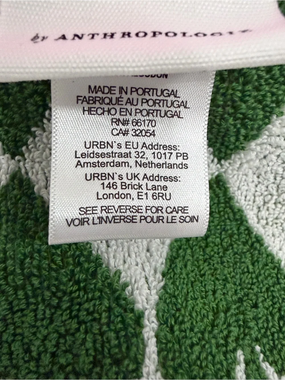 Anthropologie Green and White Heart Pattern Towel with Pink Trim bath towel set